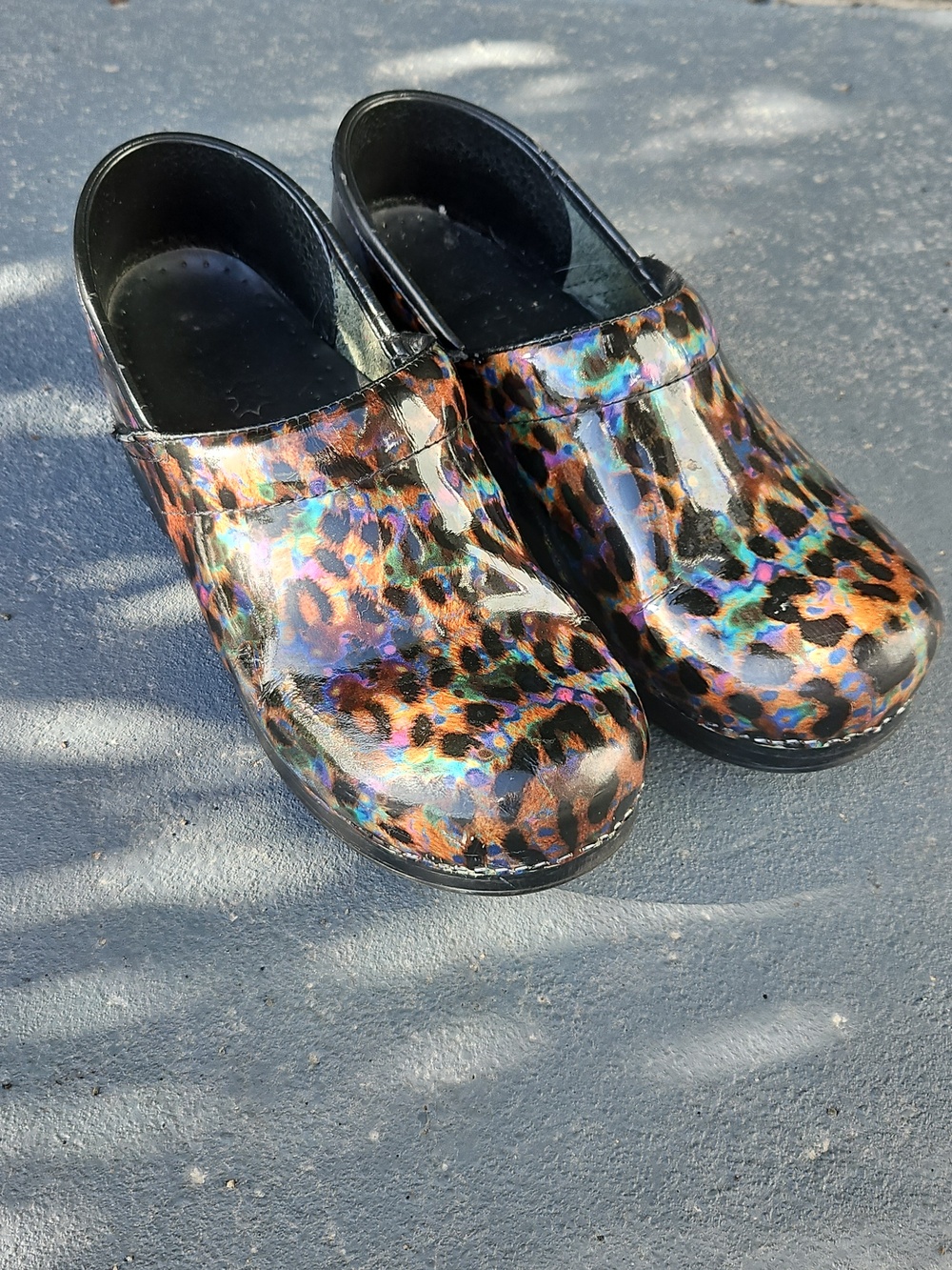 Dansko Leopard Print Patent Leather Clogs with Multicolor Spots